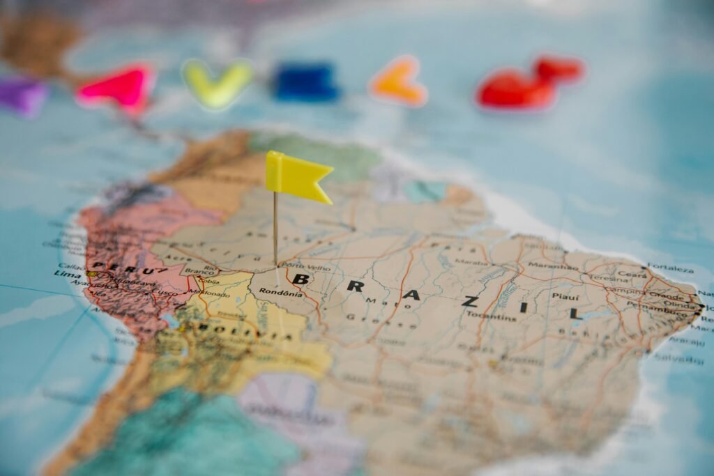 Detailed close-up map of South America highlighting Brazil with a yellow flag pin.
